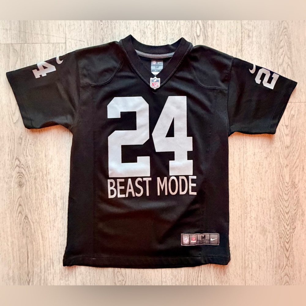 Official NFL RARE Kids Oakland Black/Gray Beast Mode Lynch #24 Jersey. Size Med